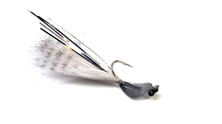 Spoon Flies Er Ske Formede Fluer, Som Går I Vandet Som Et Blink Med Vimsende Og Uforudsigelige Slag Ud Til Siderne