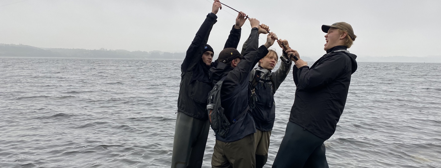 Fiskeakademiet Raising Flag